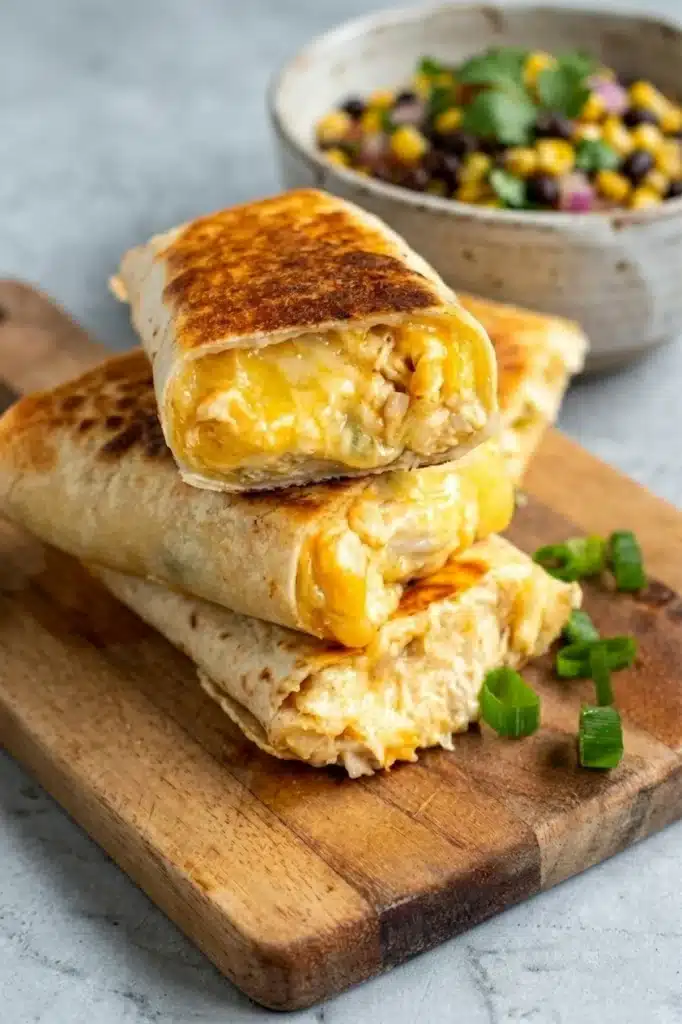 Cheesy Garlic Chicken Wraps served with fresh salad