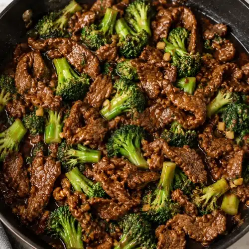 Chinese Beef and Broccoli stir fry in pan with glossy sauce