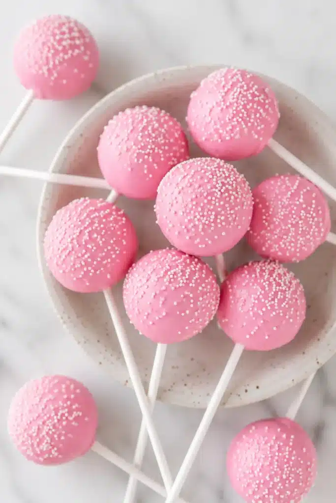 Starbucks Cake Pops with pink coating and white sprinkles top view
