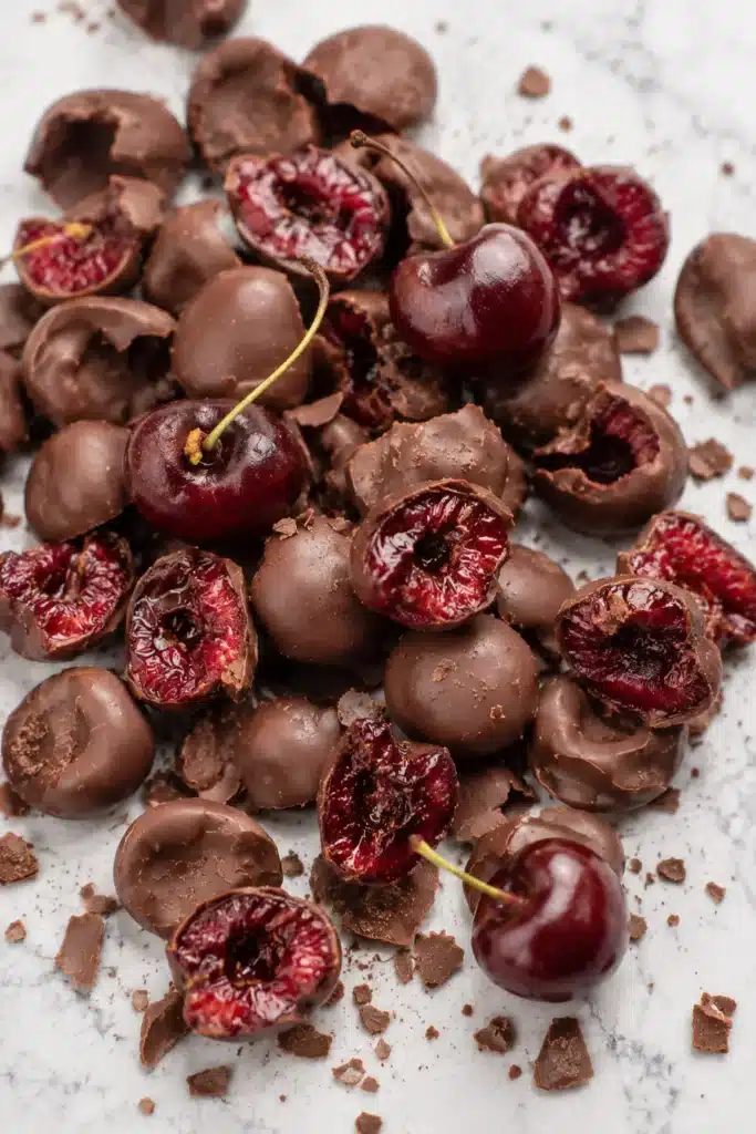 Chocolate-covered cherries with smooth chocolate coating and juicy red cherry centers.